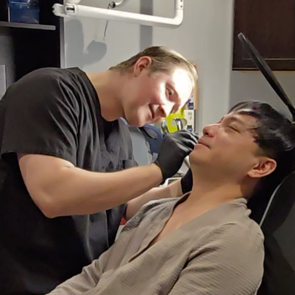 Dr. Von Plitt examines patient for a consultation for lipoma removal and lump under skin